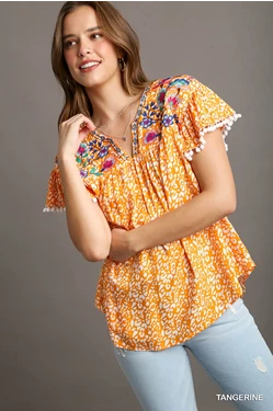 Tangerine Sunset Embroidered Top | Umgee Animal Print Top Pom Pom Fringe Details